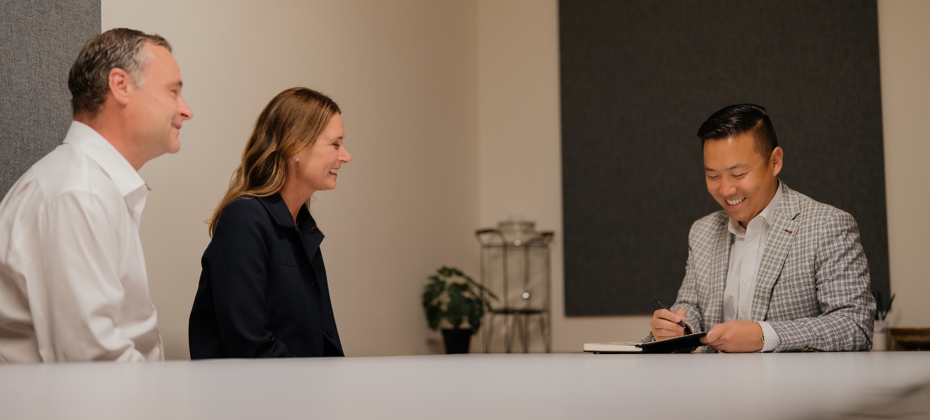 Aaron Yoon, CFP, meets with clients in North Lake Wealth Advisors' offices in Seattle